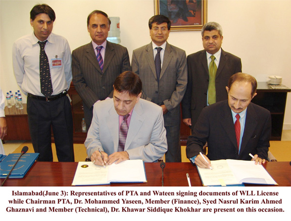 representative of pta and wateen signing documents 