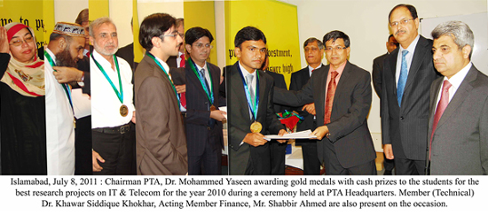 chairman pta awarding gold medals with cash prizes