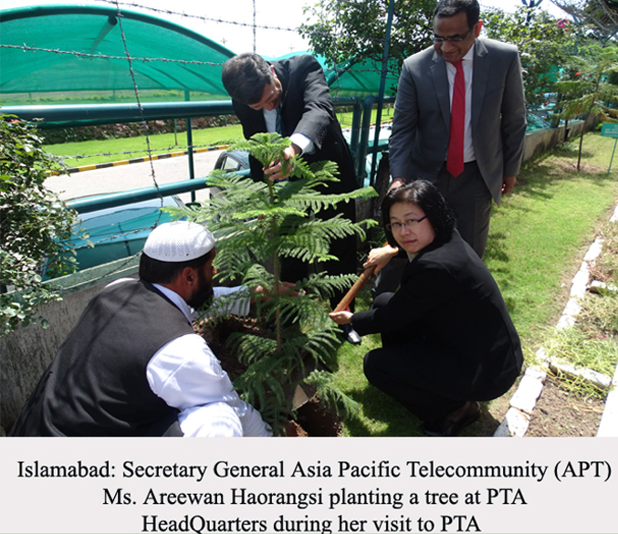 Secretary General AsiaPacific Telecommunity Ms. Areewan Haorangsi planting a tree at PTA