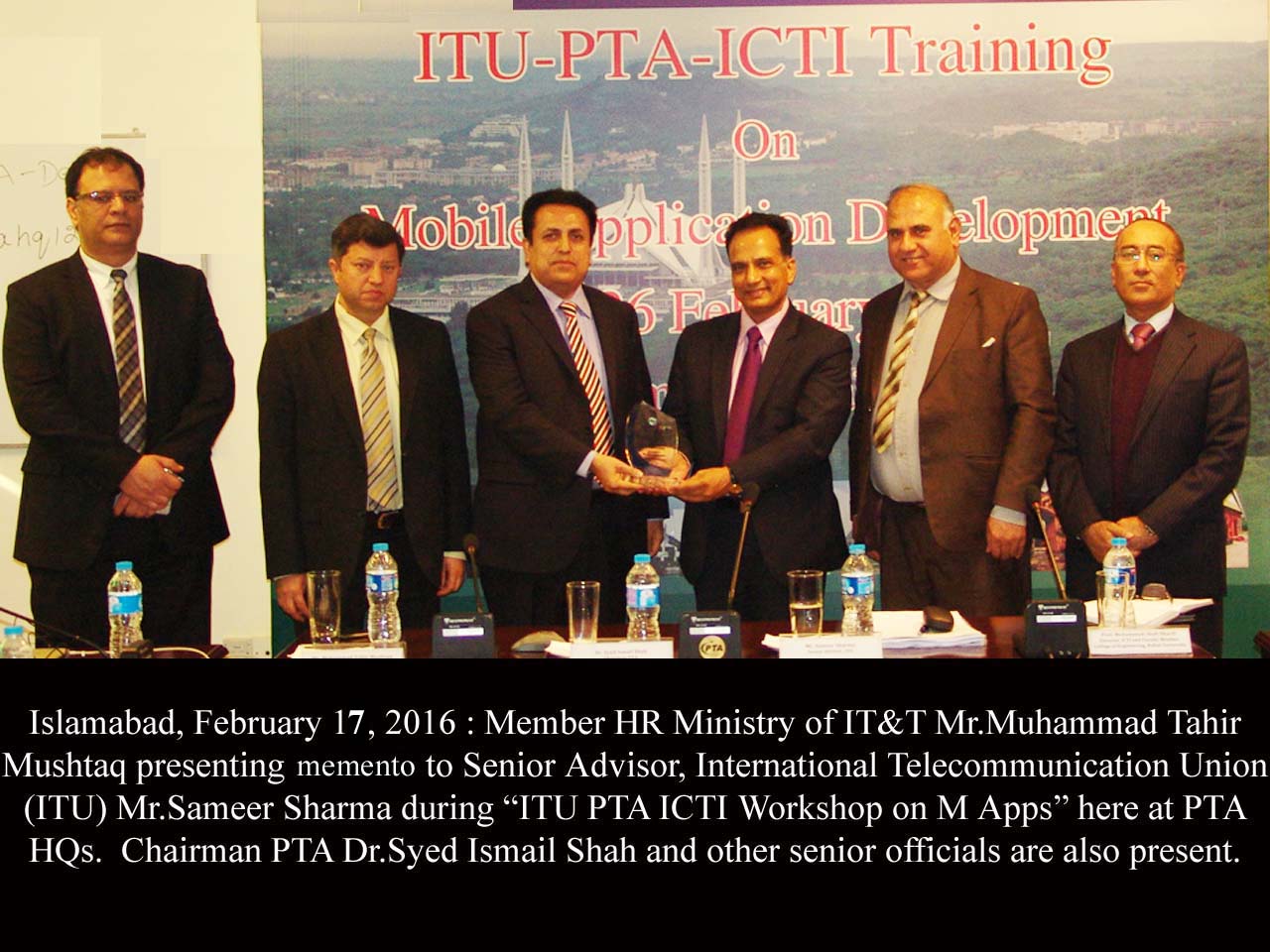 HR Minister of IT and Telecom  presenting memento